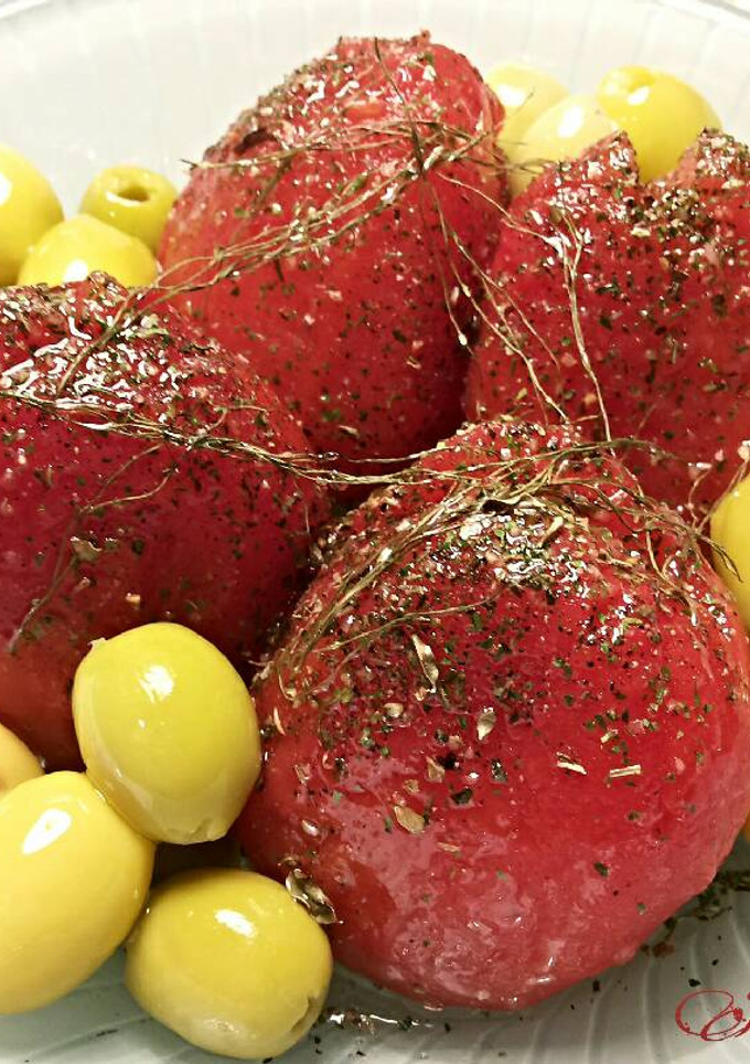 Una foto de Tomates peras cocidos y aliñados