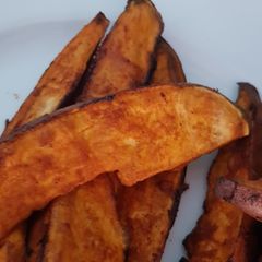 Roasted sweet potato wedges A picture of Roasted sweet potato wedges.