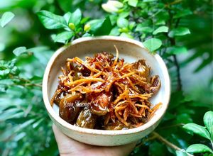 Hình của món Mứt Cóc Non Vị Ô Mai.