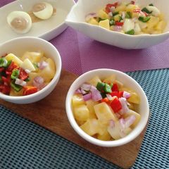 Potato salad wight a side of deviled eggs A picture of Potato salad wight a side of deviled eggs.