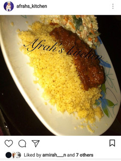 A picture of Steamed cous cous with stew.