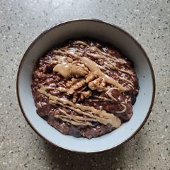 A picture of Chocolatey Banana, Blueberry and Cocoa Porridge.