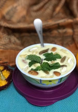 A picture of Orange Kheer/ Kheer Komola.