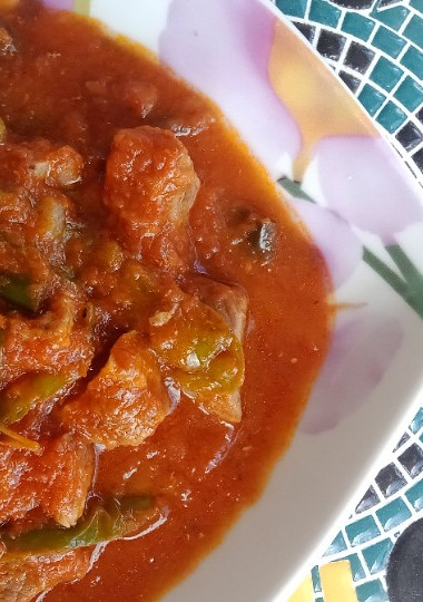 Una foto de Magro con tomate