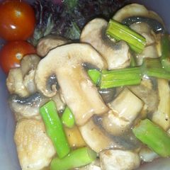 A picture of Fried Tofu with Asparagus and Mushroom Sauce.