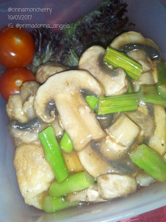 A picture of Fried Tofu with Asparagus and Mushroom Sauce.