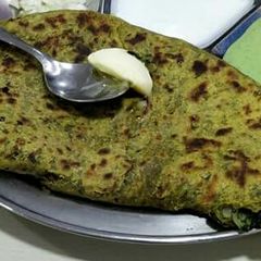 Palak paneer paratha A picture of Palak paneer paratha.