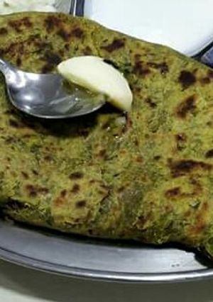 A picture of Palak paneer paratha.