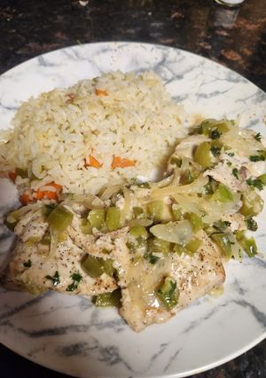 Una foto de Pescado dorado al ajillo