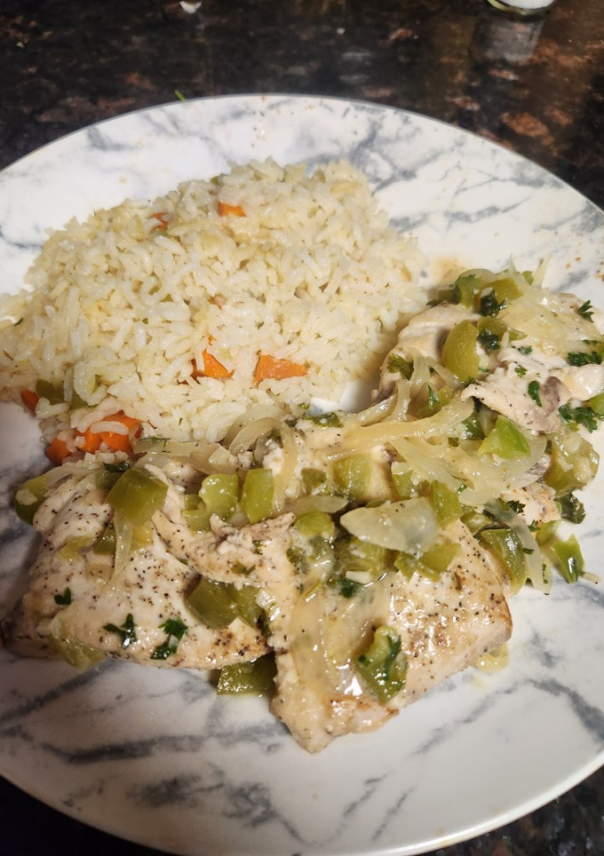 Una foto de Pescado dorado al ajillo