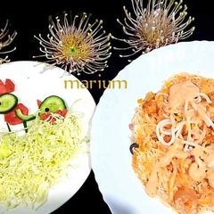A picture of Nest veggie Singaporean rice.