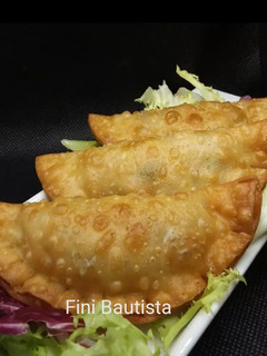 Una foto de Empanadillas de obleas fritas de mejillones