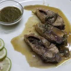 Stream Hilsa fish with green chilli and onion A picture of Stream Hilsa fish with green chilli and onion.
