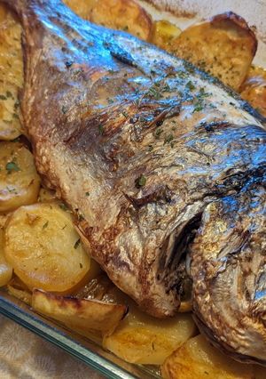 Foto principal de Dorada al horno con patata panadera