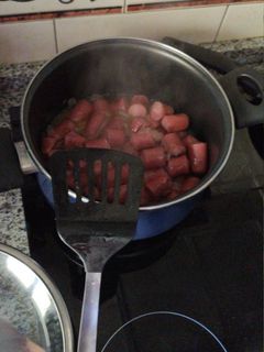 Una foto de Salchichas al vino