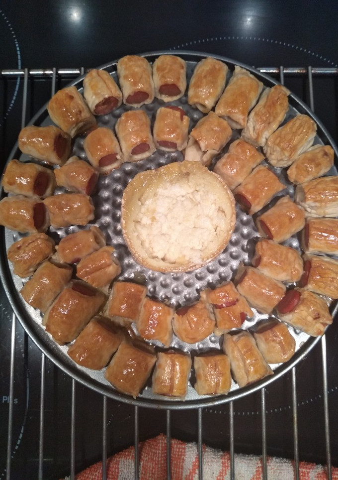 Una foto de Salchichitas con hojaldre para untar en queso