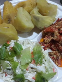 A picture of Sweet potatoes,fried egg and salad.