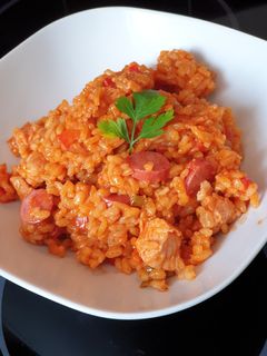 Una foto de Arroz de domingo con 3 carnes