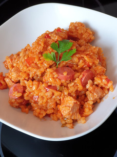 Una foto de Arroz de domingo con 3 carnes