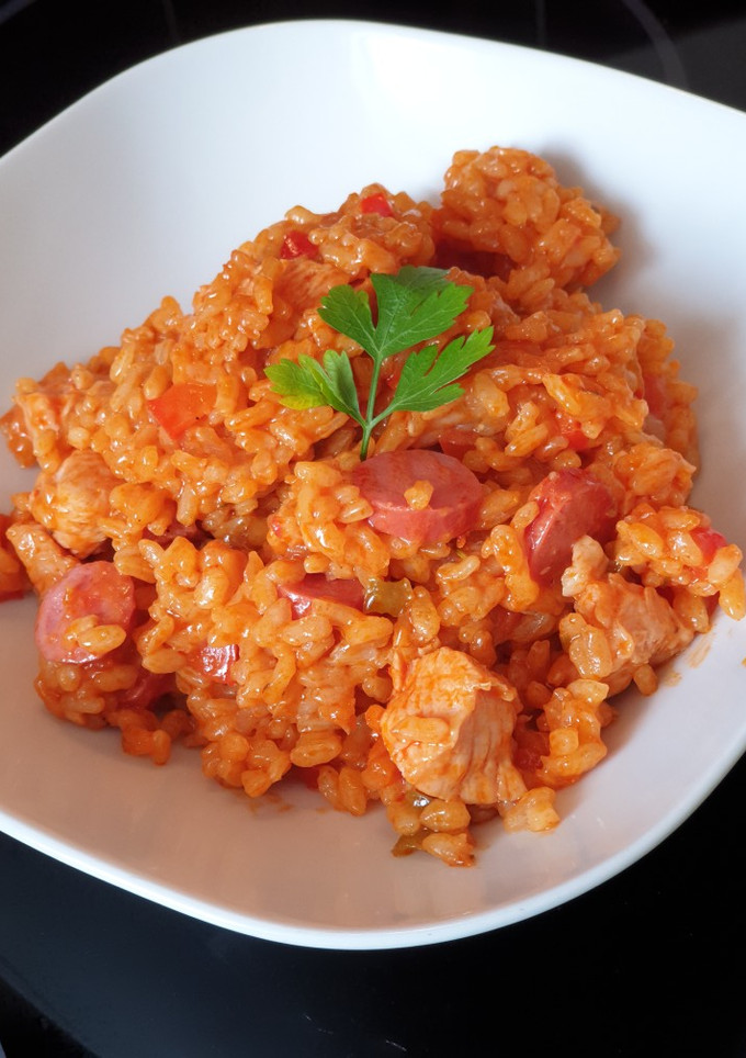Una foto de Arroz de domingo con 3 carnes