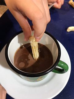 Una foto de Xocolata amb xurros ☕️ (chocolate con churros)