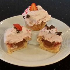 Fresh Strawberry Chocolate Truffle Cupcakes with Fresh Strawberry Whipped Cream Frosting A picture of Fresh Strawberry Chocolate Truffle Cupcakes with Fresh Strawberry Whipped Cream Frosting.