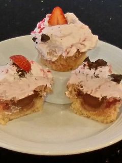 A picture of Fresh Strawberry Chocolate Truffle Cupcakes with Fresh Strawberry Whipped Cream Frosting.