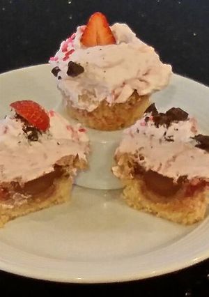 A picture of Fresh Strawberry Chocolate Truffle Cupcakes with Fresh Strawberry Whipped Cream Frosting.