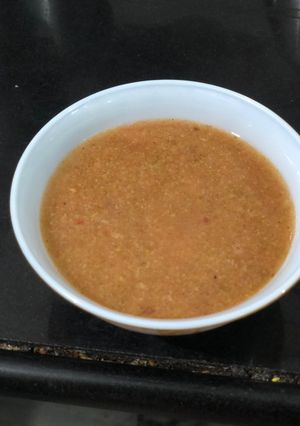 A picture of Broccoli and Tomato soup.