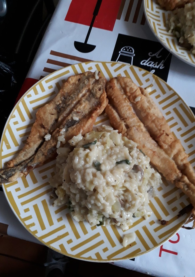 Una foto de Risotto de champiñones con pescado frito