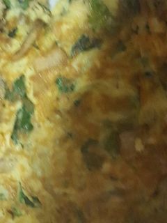 Una foto de Tortilla de champiñón con espinacas