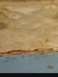 Una foto de Empanada de pollo la masa lleva queso