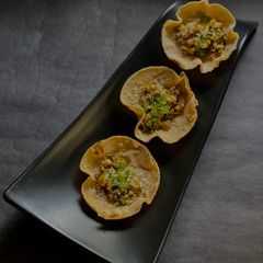 A picture of Mushroom Starter in Tortilla cups.