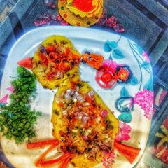 A picture of Three flour birdie uttapam.