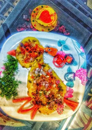 A picture of Three flour birdie uttapam.
