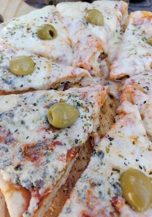 Una foto de Pizza a la parrilla 😋