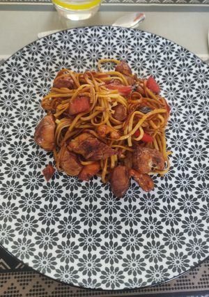 Une photo de Sauté de poulet aux noix de cajou, miel et soja