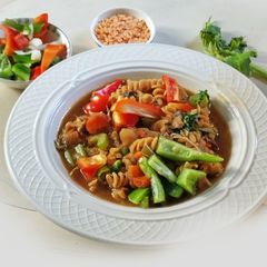 A picture of Chickpea pasta with red Lentil and Colorful Vegetables.