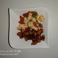 A picture of Squared fried plantain with boiled eggs veggies.