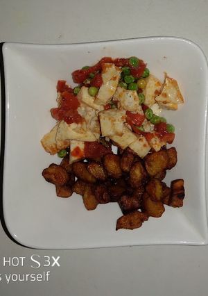 A picture of Squared fried plantain with boiled eggs veggies.