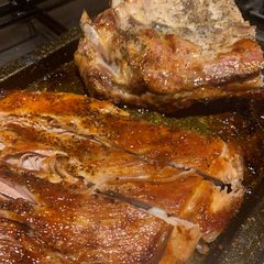 A picture of Slow cooked rack of pork ribs with a sticky bbq sauce.