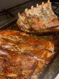 A picture of Slow cooked rack of pork ribs with a sticky bbq sauce.