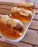 Brioche de butifarra con queso fundido y pisto