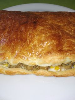 Una foto de Empanada de champiñones, maíz y gorgonzola
