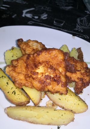 Fokhagymás csirkemell csíkok steak burgonyával recept fotója