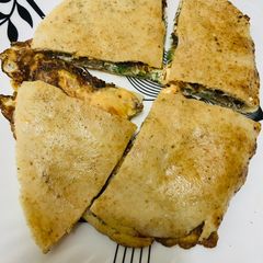 A picture of Arabic bread egg sandwich.