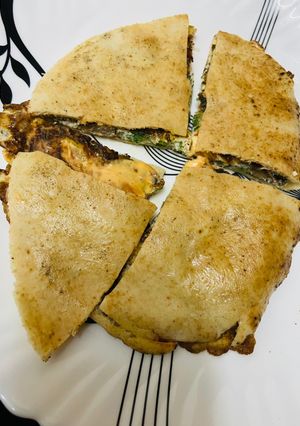 A picture of Arabic bread egg sandwich.