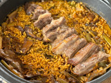Arroz de secreto ibérico con boletus y alcachofas