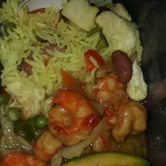 A picture of Curry rice with prawn sauce.