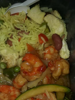 A picture of Curry rice with prawn sauce.